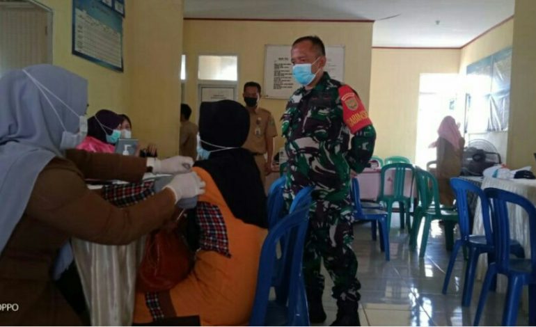 Sertu Zainal Abidin Babinsa Koramil 12/Baturaja, Pengawasan Vaksin Covid-19
