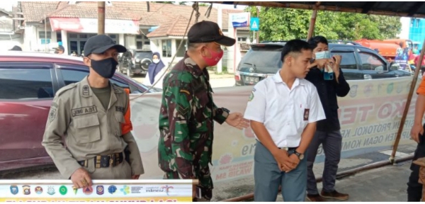 Babinsa Koramil 13/Lubuk Batang Melaksanakan Kegiatan PPKM Level 2
