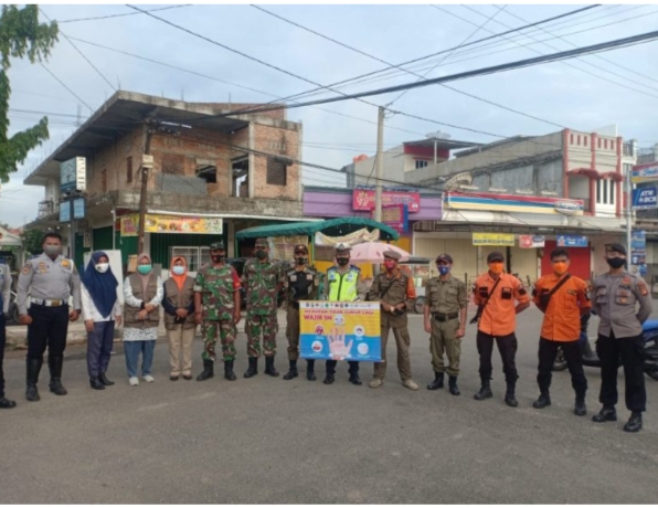Babinsa Koramil 13/Lubuk Batang Ikuti Apel Gabungan Bersama Forkopimcam Dalam Rangka Himbau PPKM